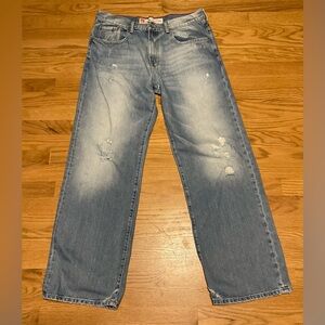 Men's Mossimo Denim Supply Co. Faded Blue Distressed Cooper Jeans.